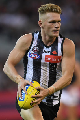 True colours: Adam Treloar playing for the Magpies.