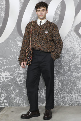 British diver Tom Daley poses for photographers upon arrival at the Dior Men’s fashion collection presented in London. 