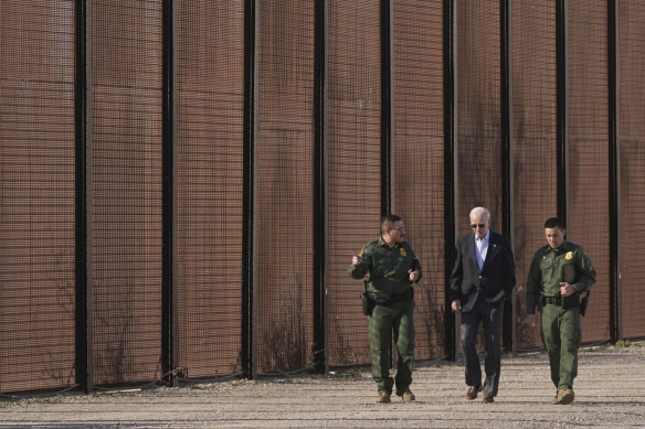 US President Joe Biden made an unannounced stop along the 18-foot border wall that separates El Paso from Juárez, Mexico, talking to Border Patrol agents as he strolled.