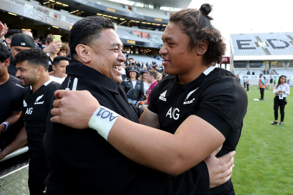 Caleb Clarke and his father and fellow All Black Eroni after Sunday's victory over the Wallabies.