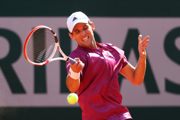 Dominic Thiem of Austria plays a forehand in his first round match against Pablo Andujar of Spain during day one of the 2021 French Open at Roland Garros.