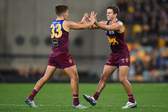 The Lions celebrate a goal en route to a comfortable win over the Bulldogs.