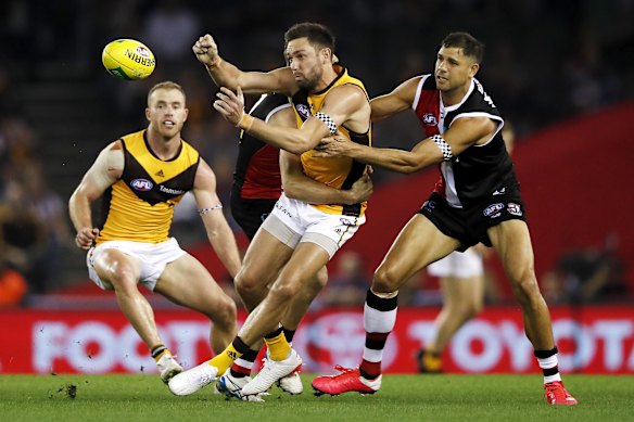 Jack Gunston is tackled by Paddy Ryder.