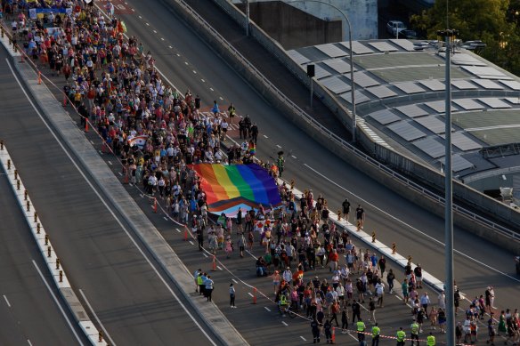 People take part in a march for equality during Sydney WorldPride last year.