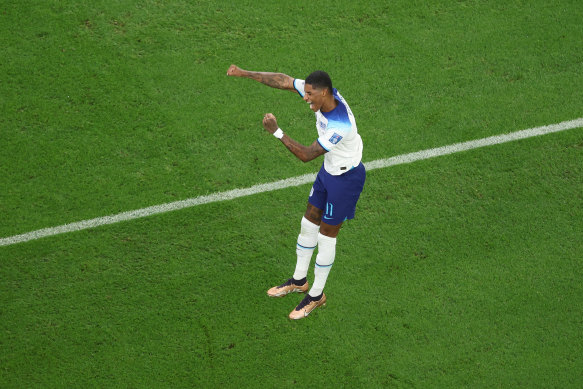 Marcus Rashford celebrates his second.