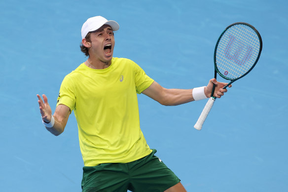 Alex De Minaur of Australia celebrates after winning against Taylor Fritz of the USA during their group stage match of the 2024 United Cup at RAC Arena in Perth.