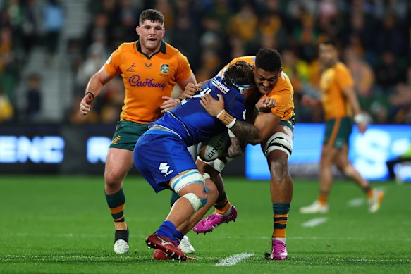 Miles Amatosero crunching an Italian rival in Perth.