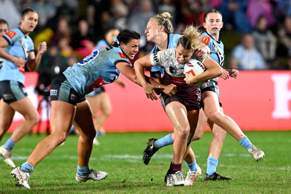 Lauren Brown takes on the NSW defence at Sunshine Coast Stadium on Friday night. 