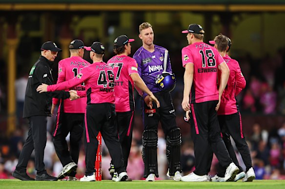 The Sixers celebrate the win.