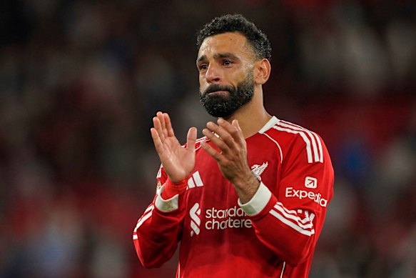 Liverpool’s Mohamed Salah breaks down in tears after full-time.