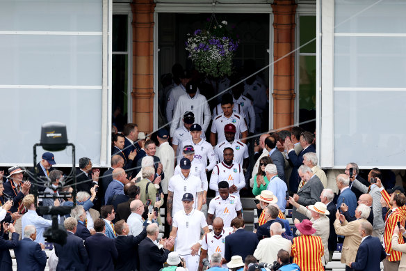 Anderson leads England from the Long Room onto the field at Lord’s.