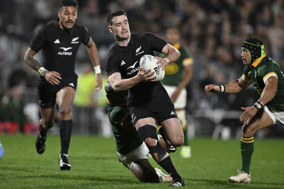 New Zealand’s Will Jordan runs at the defence during the Rugby Championship test match against South Africa.