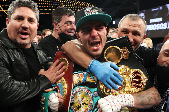 George Kambosos Jnr celebrates his split-decision win against Teofimo Lopez.