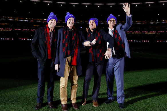 Neale Daniher (second from left) with his brothers, left to right, Terry, Chris and Anthony at the MCG on Friday night