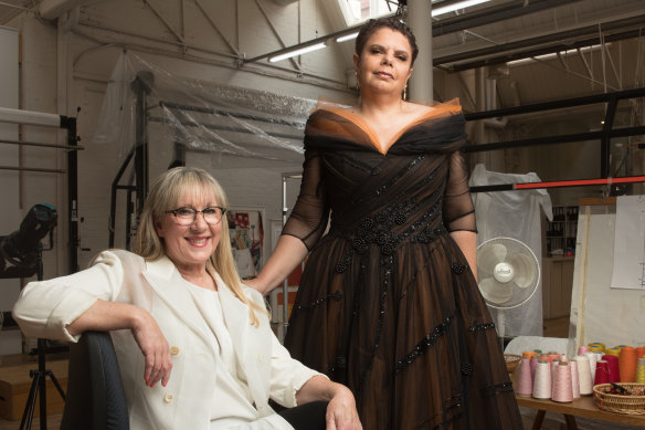 At the Australian Tapestry Workshop, Deborah Cheetham wears a gown designed by Linda Britten inspired by a work by Nanyuma Napangati and Polly Brown Nangala.