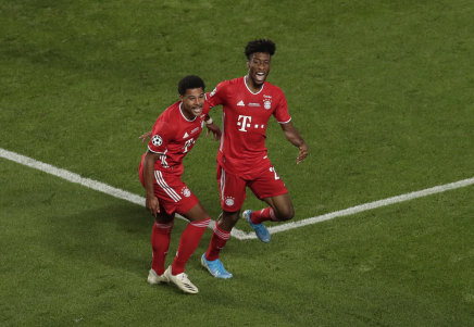 Kingsley Coman (right) celebrates with Serge Gnabry.