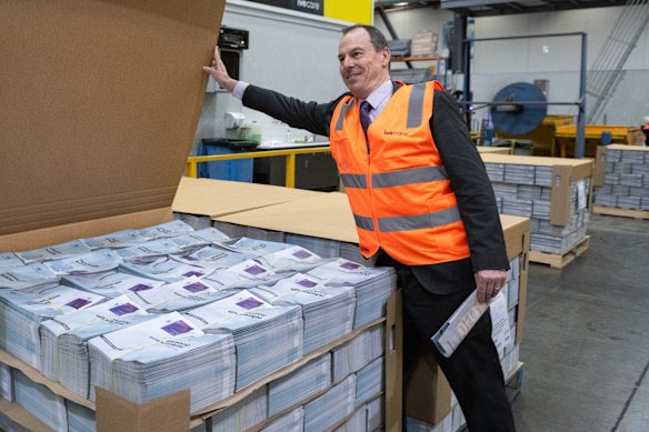 Jeff Pope, then deputy electoral commissioner, in 2023 unveiling the Yes/No pamphlets for the Voice referendum.