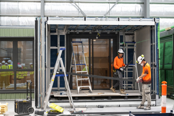 The Commonwealth Bank will relax its lending rules for prefabricated homes, which are being constructed at Modscape’s factory in Essendon Fields before being transported. 