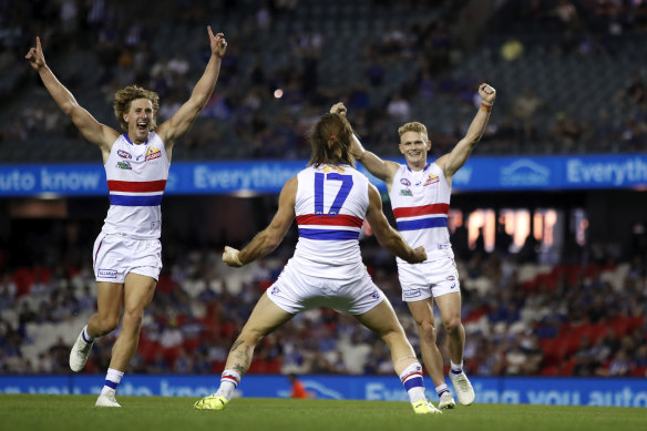 Josh Bruce celebrates after kicking his 10th goal in the match against North Melbourne.