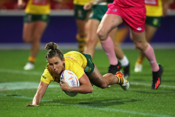 Sam Bremner crosses for the third of her four tries in Australia’s Women’s Rugby League World Cup opener.