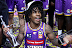 Kendric Davis of the Sydney Kings celebrates the championship win.