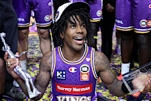 Kendric Davis of the Sydney Kings celebrates the championship win.