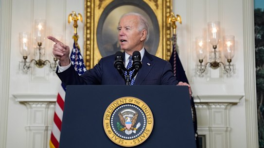President Joe Biden speaks in the Diplomatic Reception Room of the White House