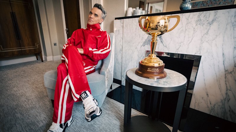 How the Victoria Racing Club landed pop superstar Robbie Williams to perform at Flemington on Cup Day