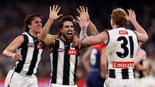 Collingwood’s Josh Daicos celebrates on the siren as the Pies beat Melbourne.