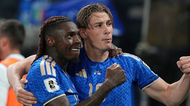 Moise Kean and Francesco Pio Esposito celebrate the former’s goal for Italy.