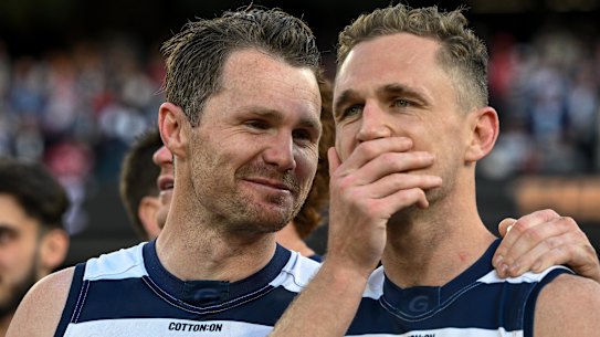 Patrick Dangerfield celebrates a premiership with Cats’ skipper Joel Selwood.