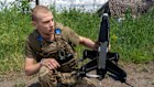A Ukrainian soldier prepares to launch an interceptor drone in Kharkiv, eastern Ukraine.