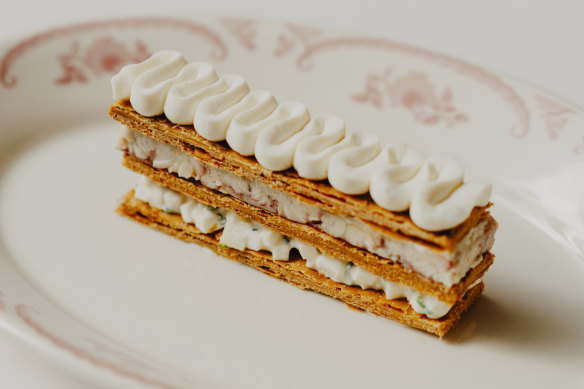 Millefeuille d’anguille fume. the flaky pastry sandwiching smoked eel, horseradish and remoulade.