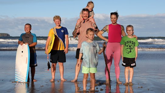NSW South Coast couple Steph Powell, 39, and husband Mark Powell, 40, with their five sons (L-R): Harlo, 11, Taj, 13, Bodhi, 3, Sabre, 7, Hendrix, 9. Steph says she would have more children if they didn’t grow up. 