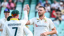 Josh Hazlewood of Australia celebrates the wicket of Ryan Rickelton of South Africa.