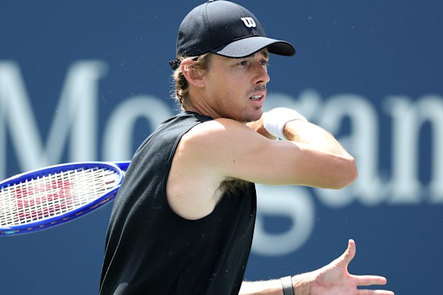 Alex De Minaur returns a shot in his practice