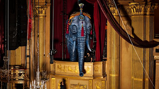 Head technician Scott McKenna and deputy head technician Lani McGregor installing the set for Moulin Rouge.