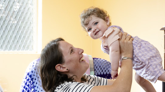 Amy McAuliffe with her daughter Bernadette, 9 months, waited three months for parental leave pay.