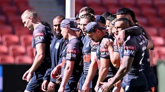 NSW Blues players complete their captain’s run at Suncorp Stadium on Tuesday.