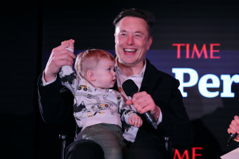 Elon Musk, at the Time 2021 Person of the Year awards with his son X Æ A-12 in December. 