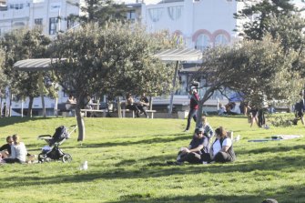 Bondi Beach today during lockdown. The Herald is not suggesting people in this photo have breached any COVID rules.
