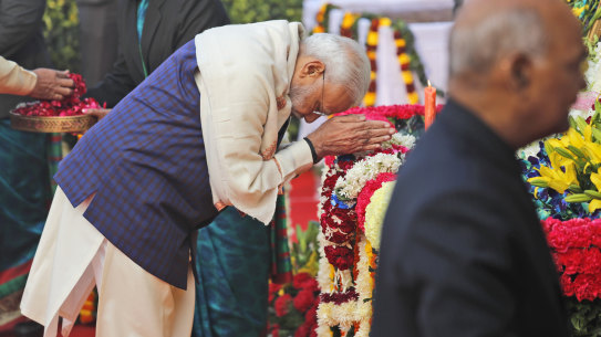 Indian Prime Minister Narendra Modi pays tributes on the death anniversary of BR Ambedkar at the parliament house, in New Delhi, on Friday. Ambedkar, the father of the Indian Constitution, was also a freedom fighter, social reformer and a politician. 
