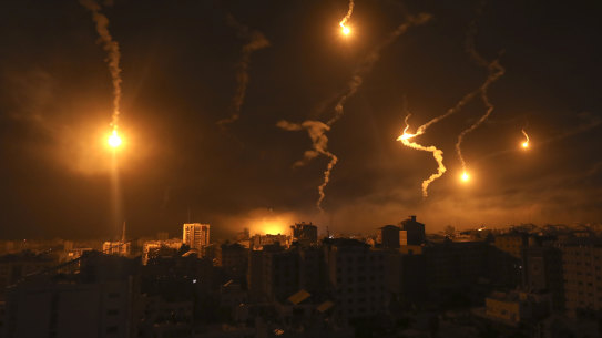 Israeli forces’ flares light up the night sky in Gaza City, Monday, Nov. 6, 2023. (AP Photo/Abed Khaled)