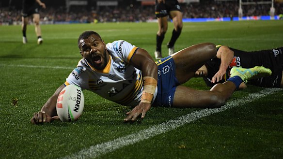 Maika Sivo scores a try during his first-half hat-trick.