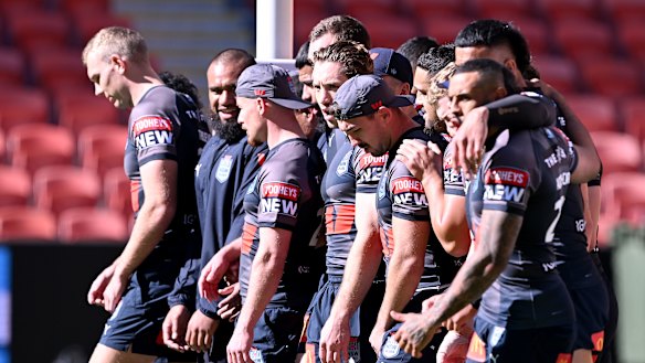 NSW Blues players complete their captain’s run at Suncorp Stadium on Tuesday.