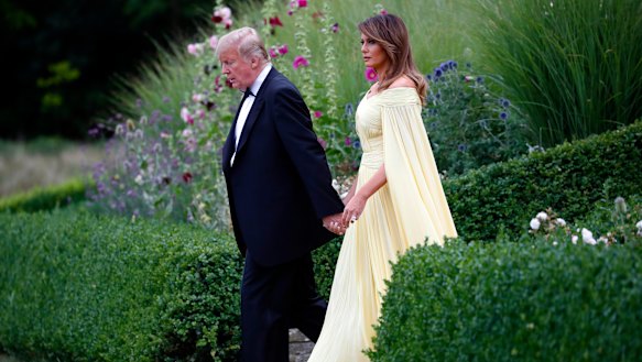 US President Donald Trump and first lady Melania Trump leave Winfield House, residence of the US ambassador, before boarding Marine One helicopter for the flight to nearby Blenheim Palace.