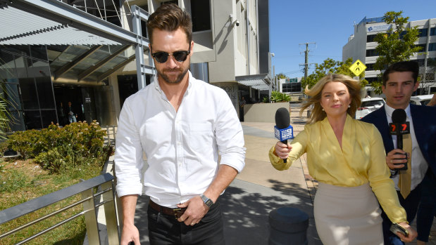 Neighbours actor Scott McGregor (left) outside the Southport Magistrates Court on Tuesday.