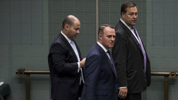 Treasurer Josh Frydenberg, Goldstein MP Tim Wilson and Mackellar MP Jason Falinski in Parliament in 2019.