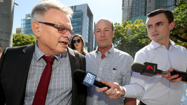 Peter Seppelt (centre) at the Adelaide Magistrates Court .