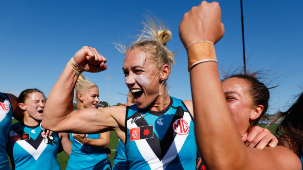 Erin Phillips and her teammates sing an emotion-charged rendition of the Power theme song.